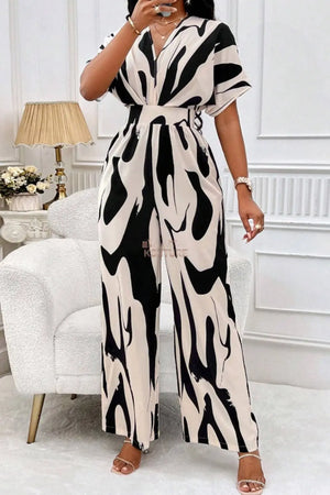 Paige Wells Jumpsuit - The Ebonee Kouture Experience Handbag Shop